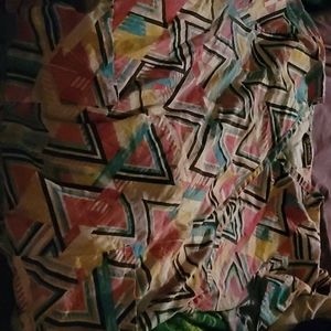 Three scrub tops and a pair of scrub tops